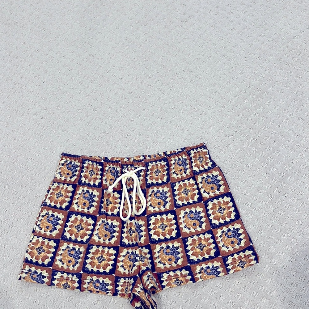 Out from under Urban Outfitters brand shorts, size medium